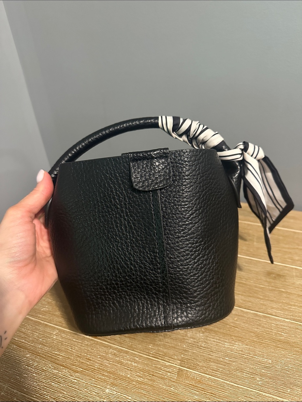 Black Pebbled Leather Bucket Bag with Scarf Accent